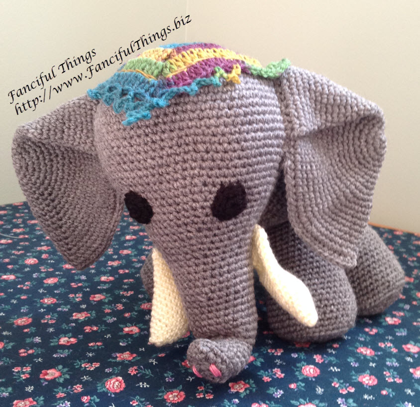 Finished crochet elephant in a standing position.